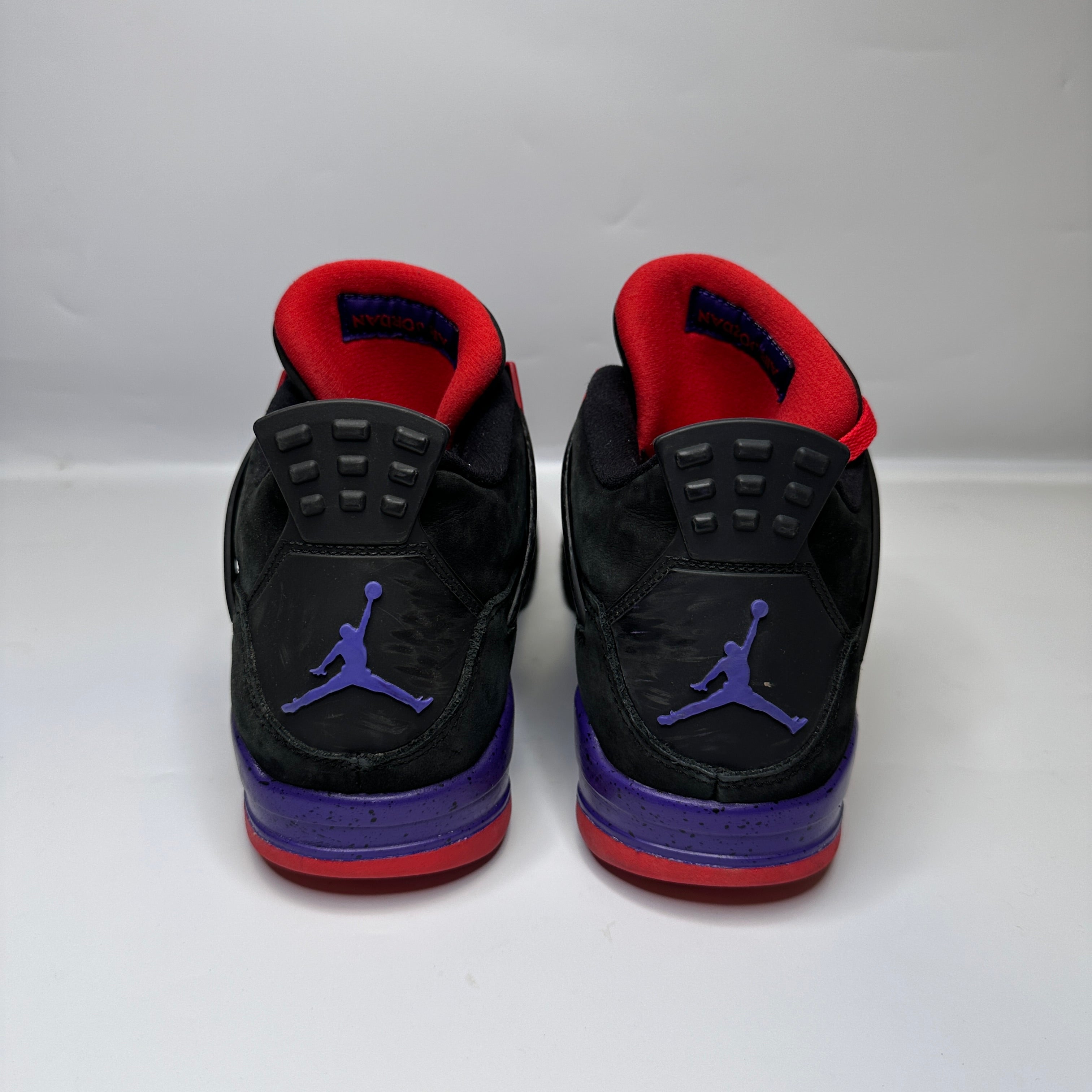 Jordan 4 hotsell raptors fake